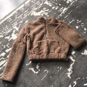 Never been worn teddy pull over sweater.